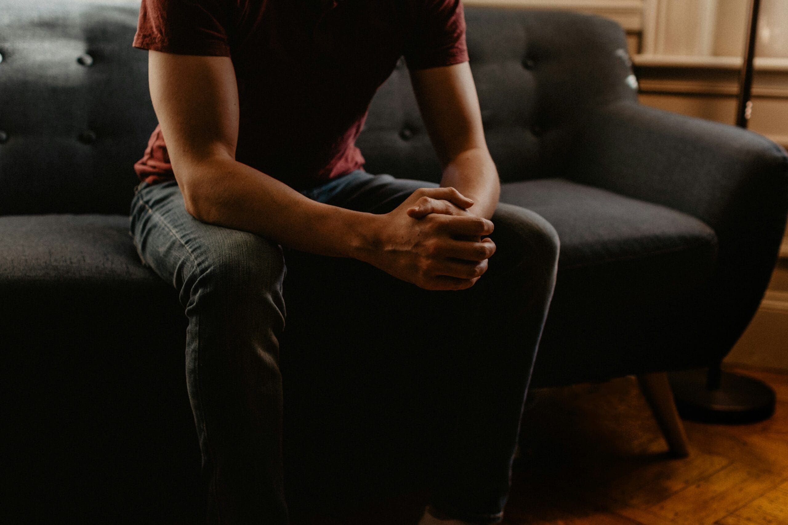 Adult searching for a trauma therapist online from home in Las Vegas, representing finding trauma-focused therapy in Nevada